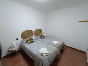 Postel nebo postele na pokoji v ubytování Rincón de Joel Habitación con baño privado