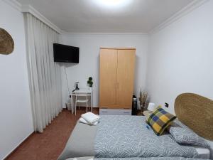 Postel nebo postele na pokoji v ubytování Rincón de Joel Habitación con baño privado