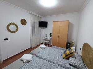 Postel nebo postele na pokoji v ubytování Rincón de Joel Habitación con baño privado
