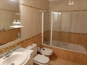 Koupelna v ubytování Rincón de Joel Habitación con baño privado