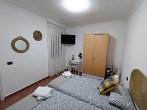Postel nebo postele na pokoji v ubytování Rincón de Joel Habitación con baño privado