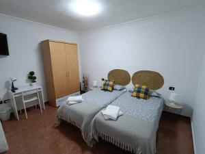 Postel nebo postele na pokoji v ubytování Rincón de Joel Habitación con baño privado