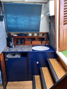 A kitchen or kitchenette at Experiencia en el mar Gijon C
