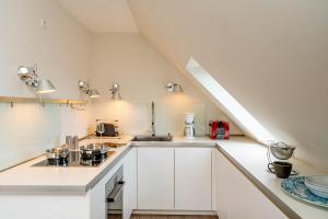 Kuchyň nebo kuchyňský kout v ubytování Ferienwohnung Seefeder