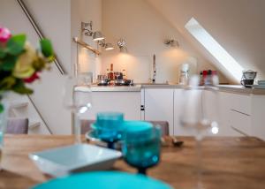 Kuchyň nebo kuchyňský kout v ubytování Ferienwohnung Seefeder