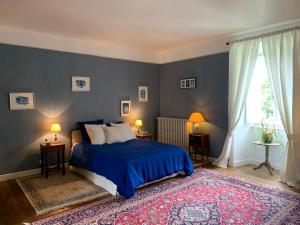 Postel nebo postele na pokoji v ubytování Maison d'Hôtes de l'Ancien Couvent des Carmes + 25 fotografií