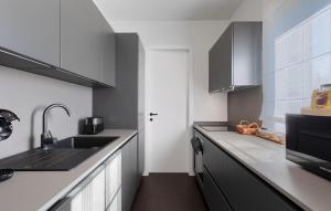 Kuchyň nebo kuchyňský kout v ubytování Villa-Minerva