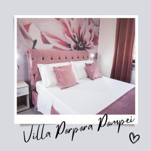 เตียงในห้องที่ VILLA PORPORA