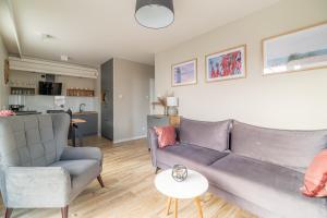 Kuchyňa alebo kuchynka v ubytovaní Horyzont Apartamenty - Osiedle Bursztynowe