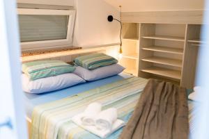 Posteľ alebo postele v izbe v ubytovaní Apartments Janeš