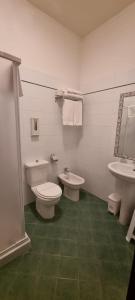 A bathroom at Hotel I Platani Még 37 kép