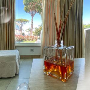 a vase sitting on a table in a room at Female Resort in San Felice Circeo