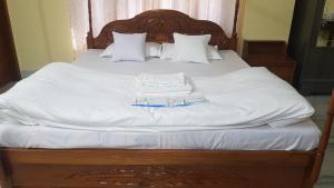 Katil atau katil-katil dalam bilik di Singhas' Home