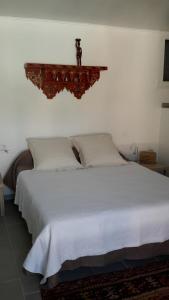 Giường trong phòng chung tại La Chambre De Salome