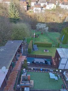 an aerial view of a garden with a table and chairs at Ferienwohnung Hilla in Taben-Rodt +1 photo