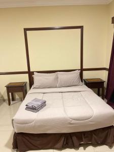 En eller flere senge i et værelse på Damai Laut Holiday Apartment + 6 billeder