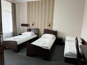 Postel nebo postele na pokoji v ubytování Villa Carmen