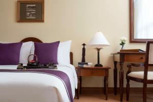 Postel nebo postele na pokoji v ubytování Hai Phong Harbour View Hotel