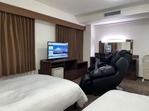 TV a/nebo společenská místnost v ubytování Hotel Alpha-One Yonago