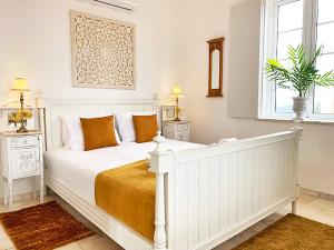 En eller flere senge i et værelse på Villa Falk - Fuzeta
