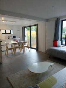 Zona d'estar a Le 79 appartement avec terrasse tout confort