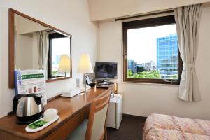 TV a/nebo společenská místnost v ubytování Hotel Keifuku Fukui Ekimae