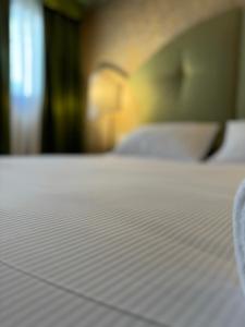 A bed or beds in a room at 312 Piazza San Marco