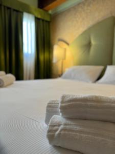 A bed or beds in a room at 312 Piazza San Marco