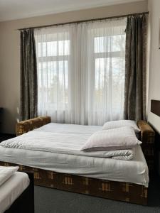 Postel nebo postele na pokoji v ubytování Villa Carmen