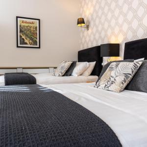 Cama o camas de una habitación en Eccles Townhouse