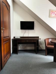 TV a/nebo společenská místnost v ubytování Villa Carmen + 37 fotografií