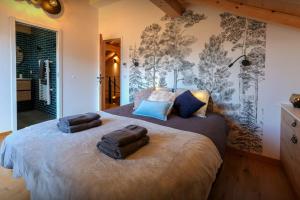 Postel nebo postele na pokoji v ubytování Chalet Chantalhys - OVO Network