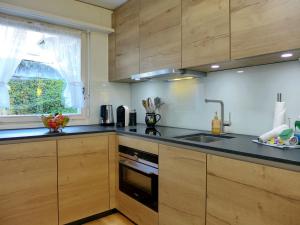 Kuchyň nebo kuchyňský kout v ubytování Holiday Home Salzhubelweg by Interhome + 18 fotografií