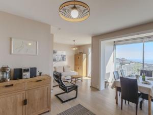 a kitchen and dining room with a table and chairs at Apartment Saint Sordelin by Interhome in Pontaillac