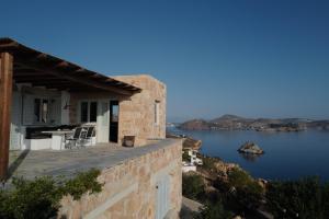 a house with a view of the water at VillainPatmos in Patmos