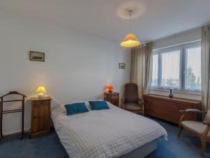 Ένα ή περισσότερα κρεβάτια σε δωμάτιο στο Apartment Moulin des Gardes by Interhome