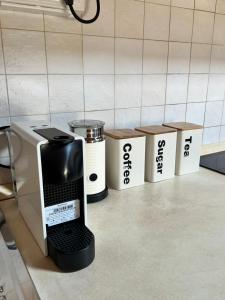 a coffee maker on a counter in a kitchen at Tintoretto 15 in Modena