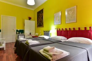 Katil atau katil-katil dalam bilik di Best Rooms Termini