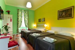 Katil atau katil-katil dalam bilik di Best Rooms Termini