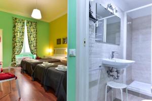 Katil atau katil-katil dalam bilik di Best Rooms Termini