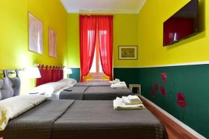 Katil atau katil-katil dalam bilik di Best Rooms Termini