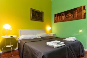 Katil atau katil-katil dalam bilik di Best Rooms Termini