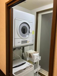 a microwave oven sitting on top of a room at STAY Moiwayama201 in Sapporo