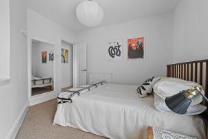 Postel nebo postele na pokoji v ubytování St John's Corner Cottage, Bury St. Edmunds