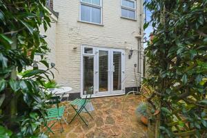 Zahrada ubytování St John's Corner Cottage, Bury St. Edmunds