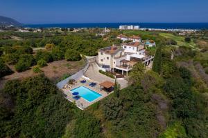 an aerial view of a house with a swimming pool at Villa Ira Finiki in Lachi