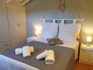 Postel nebo postele na pokoji v ubytování casa tranquila for 6 near Gaios