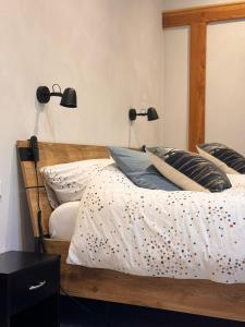 Postel nebo postele na pokoji v ubytování De Seuterhoeve