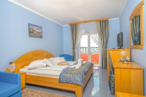 Кровать или кровати в номере Hotel Miramare