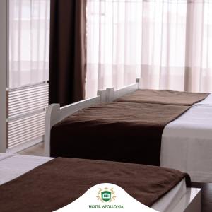 Кровать или кровати в номере Hotel Apollonia